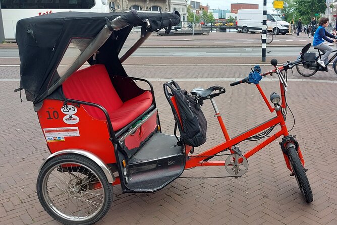 1 Hour Private Amsterdam Rickshaw Tour - Stop 1: Dam Square and the layers beneath the pigeons