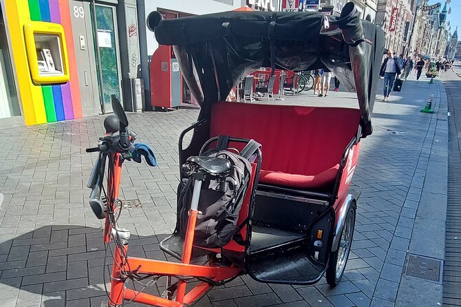 2 Hours Private Amsterdam Rickshaw Tour - Dam Square and the Red Light District: watch for the shift in vibe