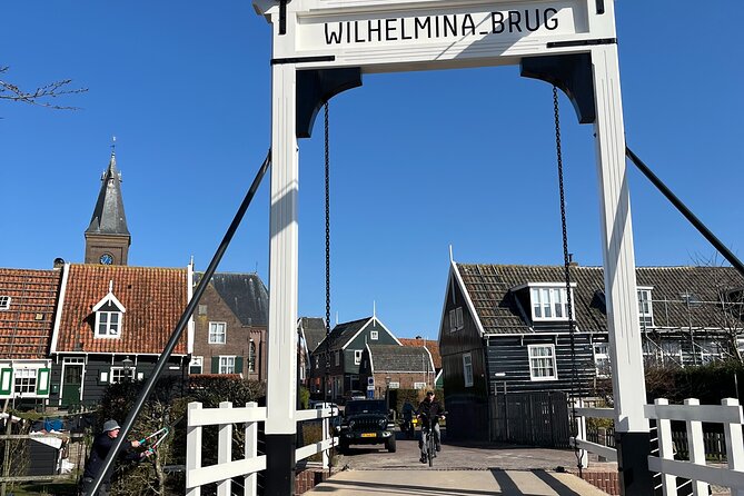 4h Private Tour from Ams to Volendam and Marken- Electric Car - Stop 2: Volendam harbor, kibelling, and time for museums and shopping