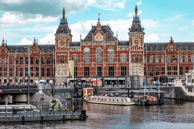 5 hrs Golden Age Amsterdam Private Walking Tour With Local Guide - The canal city’s grammar: grachten, bridges, and narrow houses