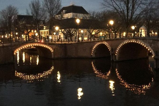 90-min Amsterdam Light Festival Tour - Comfort for winter nights: roof, blankets, and warm seating options