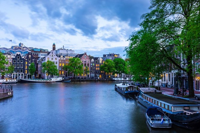 Airport Transfer: Schiphol Airport AMS to Amsterdam by Luxury Van - Finding Your Driver in Real Time