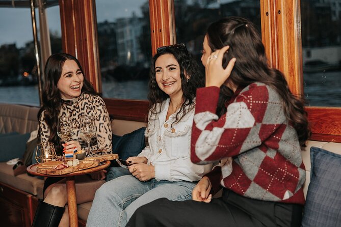 Amsterdam: 2-Hour Canal Cruise incl. Drinks & Dutch Snacks - Famous bridges, royal theater, and the rhythm of landmarks