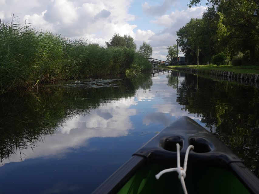 Amsterdam: 2-Hour Guided Canoe Trip - Getting to the blue house: Watergang meeting point made easy