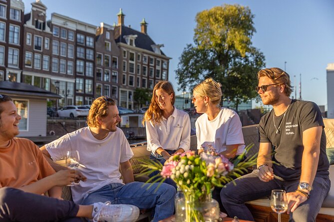 Amsterdam 2 Hour Small-Group Canal Cruise with Dutch Snacks & Bar - Sea Palace, Brouwersgracht, Munttoren, and the Golden Age finale