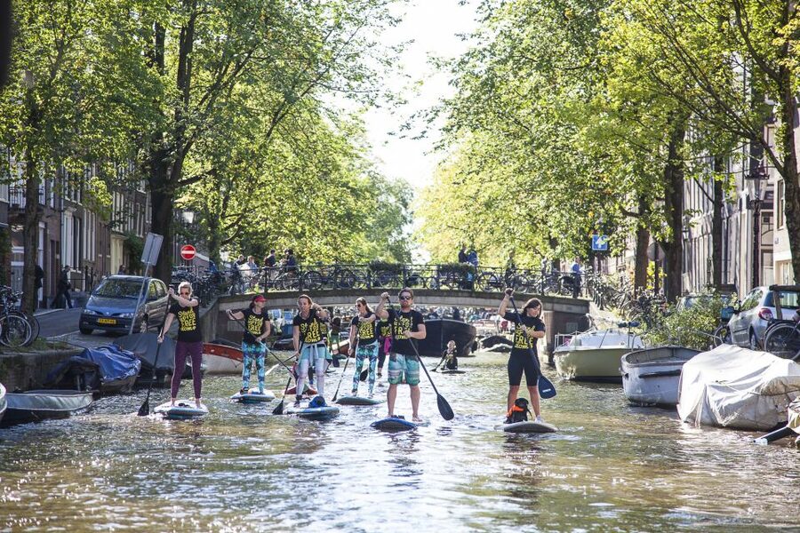 Amsterdam: 2-Hour Stand Up Paddle Board Tour - Crossing the Amstel: the moment the tour turns scenic