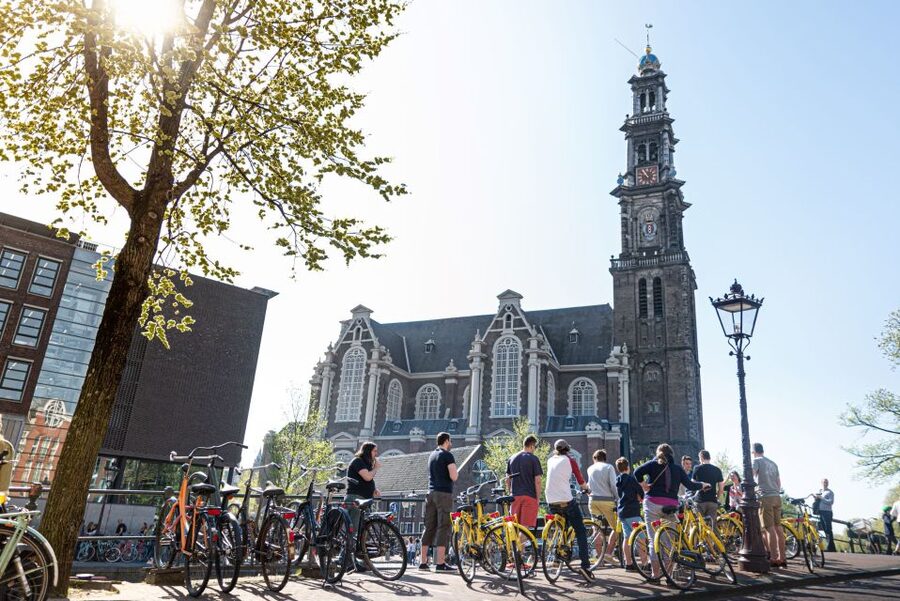 Amsterdam: 3h E-Bike Tour with break - Secret courtyards and photo moments you can repeat later