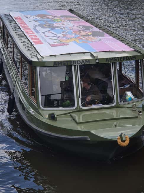 Amsterdam: 420 Smoke-Friendly Boat Tour - Getting on the Original Smokeboat right by the Red Light District