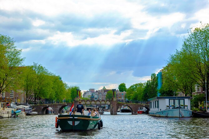 Amsterdam: 90 min Kings Day Boat Party with Unlimited Drinks - Key highlights you’ll care about