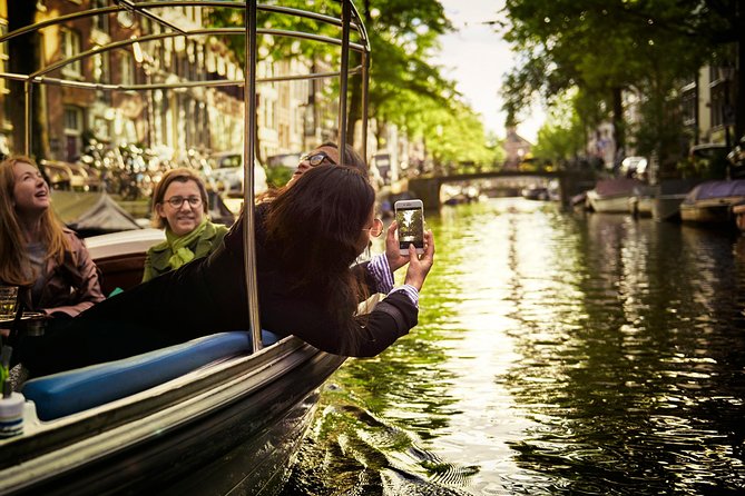 Amsterdam 90-min Private Canal Cruise with Live Guide and Drinks - Key moments that make this cruise worth your time