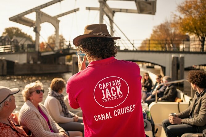 Amsterdam 90 minutes Canal Cruise with bar and snacks on board. - Neighborhood texture from the water: markets, squares, and canal-edge life