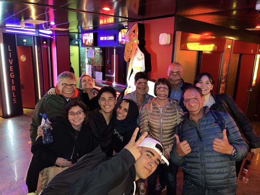 Amsterdam: After Dark Red Light District Tour - Hidden Corners, Torture-Chamber Stops, and Quick Photo Moments