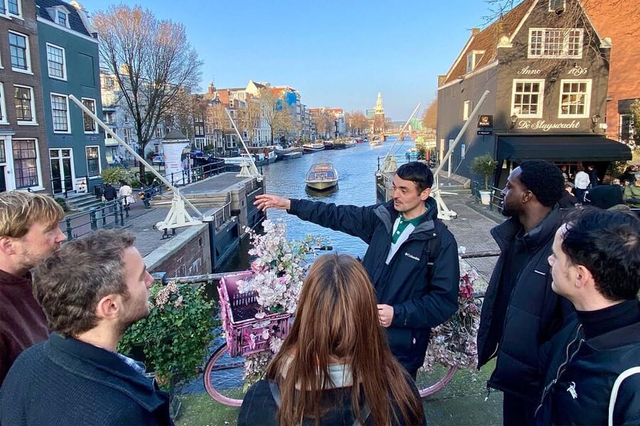 Amsterdam: Anne Frank Guided Small Group Walking Tour - Anne Frank Monument: a pause that turns history into remembrance