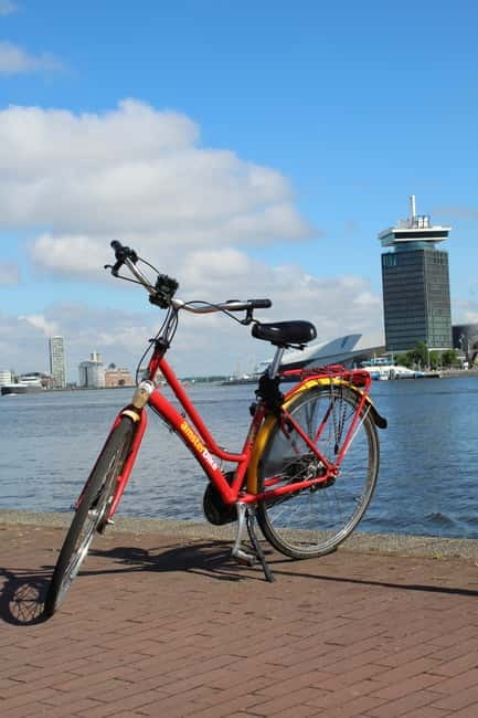 Amsterdam:: Bike Rental with Free Self-Guided Tour - Ferry ride: getting out to the Dutch countryside by bike