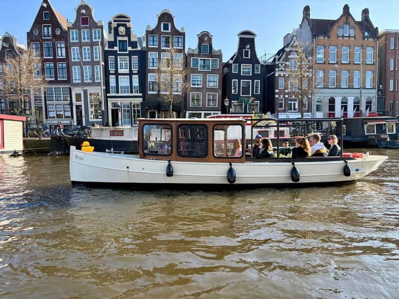 Amsterdam Canal Boat Tour with Live Guide - The Live Trilingual Captain: Stories You Can Follow