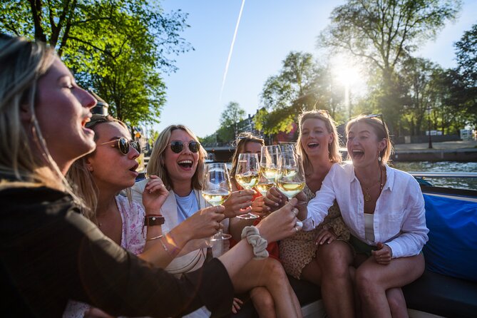 Amsterdam: Canal Booze Cruise with Unlimited Drinks Option - Amsterdam Light Festival Stop: Short Art Time, Ticket Included