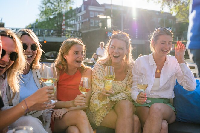 Amsterdam: Canal Booze Cruise with Unlimited Drinks Option - De Wallen on the Water: Dam Square Start/End vs City Centre Cruise