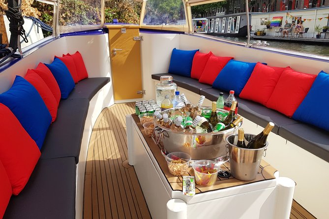 Amsterdam: Canal Booze Cruise with Unlimited Drinks Option - Start Times Matter: Daylight vs Sunset on the Amstel