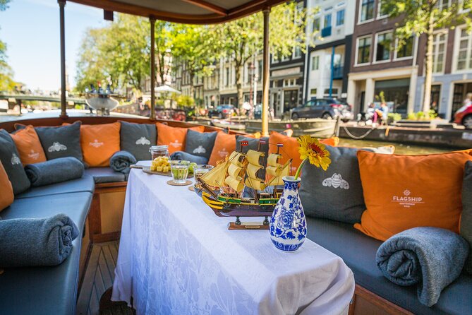 Amsterdam Canal Cruise in Classic Salon Boat With Drinks and Cheese - Canal cruise from a classic salon boat: what that really means