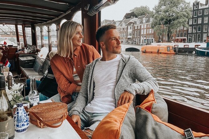 Amsterdam Canal Cruise in Classic Salon Boat With Drinks and Cheese - Weather and comfort: what to wear for the canal chill