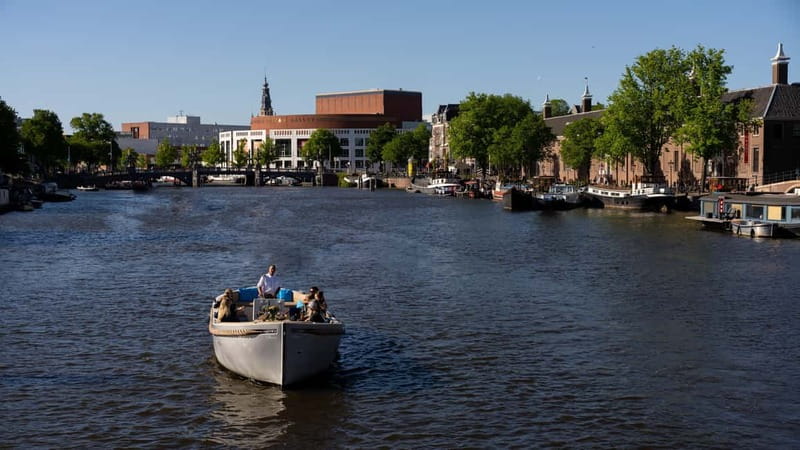 Amsterdam: Canal Cruise in Open Boat with Drink Option - Drink Option and On-Board Comfort That Actually Helps