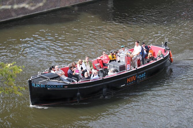 Amsterdam Canal Cruise in Open Boat with Unlimited Drinks Option - The boat setup: electric power, open air feel, and a glass-topped view