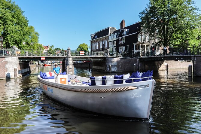 Amsterdam Canal Cruise in Open Boat with Unlimited Drinks Option - Westerkerk: the striking anchor near the Jordaan