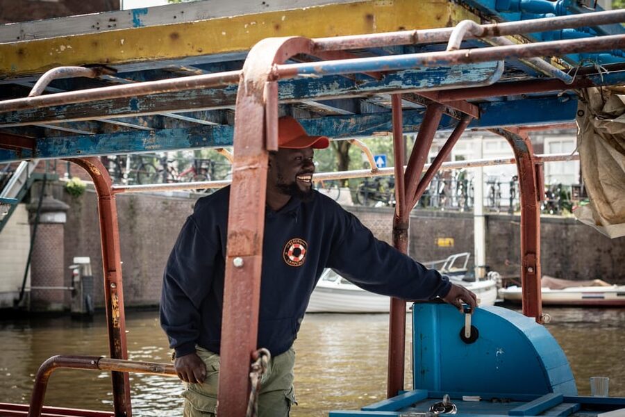 Amsterdam: Canal Cruise on a Wooden Refugee Boat - The cruise itself: 90 minutes of canals and personal migration stories