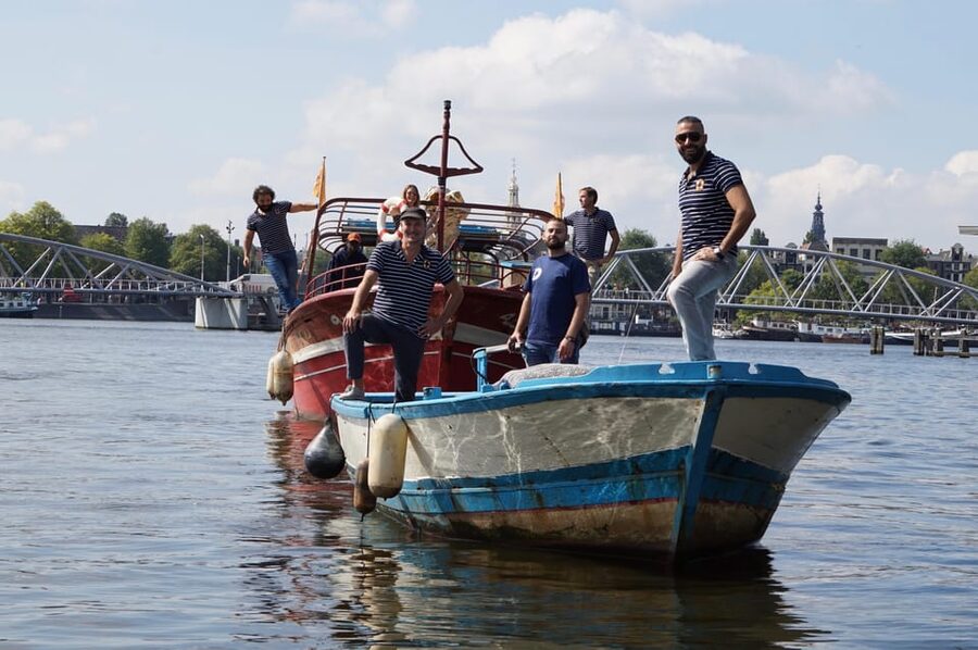 Amsterdam: Canal Cruise on a Wooden Refugee Boat - Seeing Amsterdam through a different lens than a typical canal tour