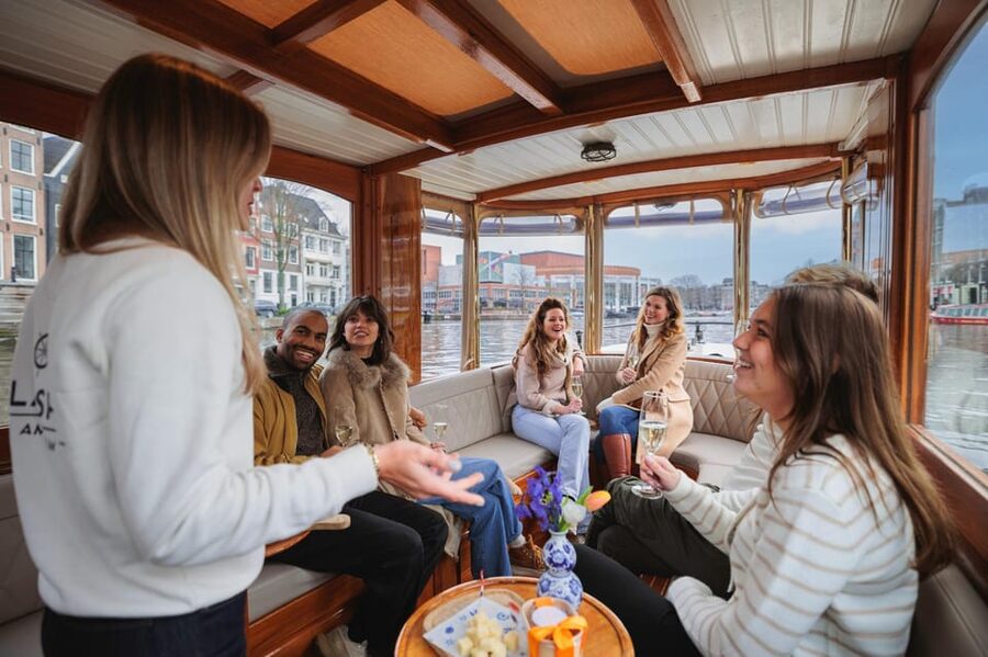 Amsterdam: Canal Cruise with Bubbles & Bites - The Crew Makes It: Skipper + Guide Energy (Sofia, Gideon, Tom & Jeff)