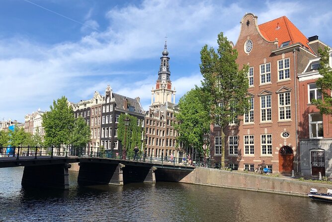 Amsterdam Canal Cruise with German Guide and unlimited drinks - Oosterdokskade to the old harbour: trade wealth and Jewish Amsterdam stories