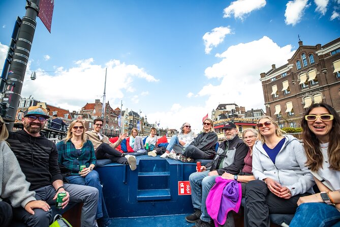 Amsterdam Canal Cruise with Live Guide and Two Drinks - Westerkerk and the Bridges: Iconic Edges in One Glide