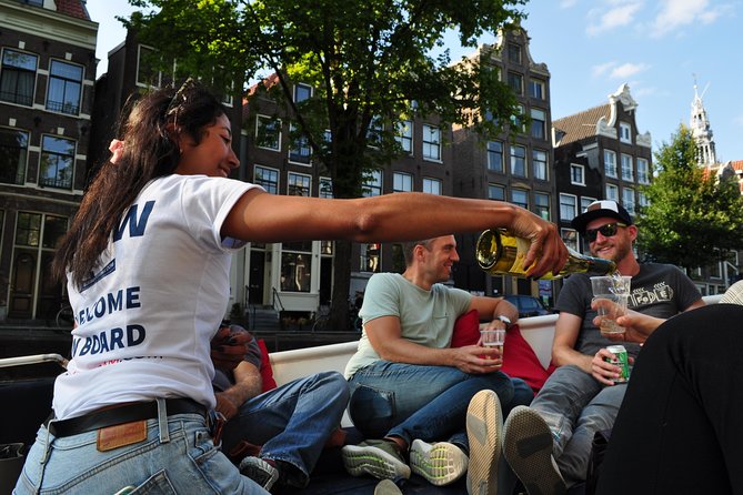 Amsterdam Canal Cruise With Live Guide and Unlimited Drinks - Getting on board: Amstel 51F, choosing your time, and timing your day