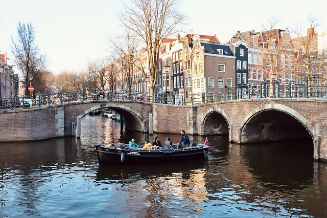 Amsterdam Canal Tour by Open Boat – 90 min Small Group Experience - Canal Belt Icons: Seven Bridges, the Gentleman Canal, and Expensive Facades