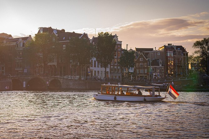 Amsterdam Champagne Private Canal Cruise - The classic wooden boat + host service that keeps your group relaxed