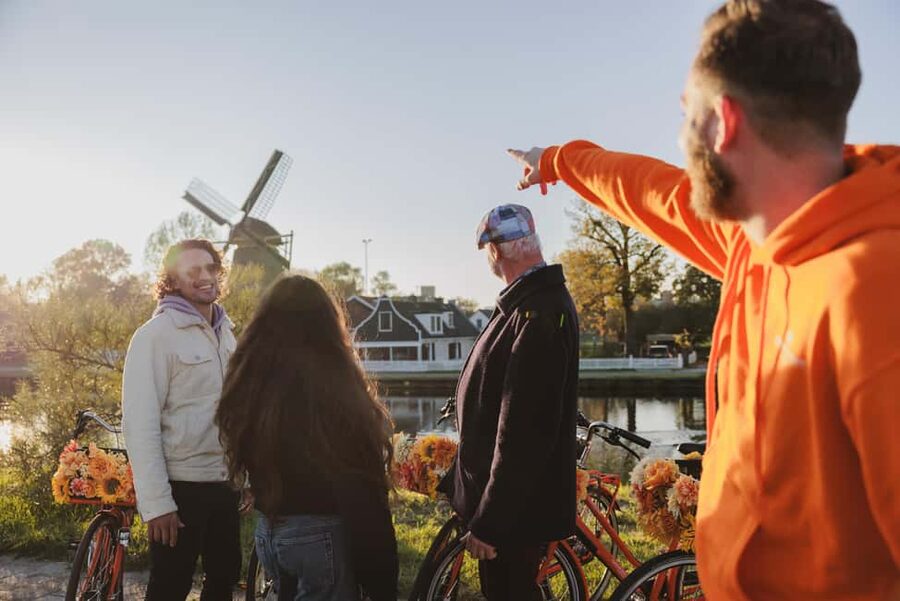 Amsterdam: Cheese Tasting, Windmill & Countryside Bike Tour - City Spins: Canals, Het Scheepvaartmuseum, and De Gooyer Windmill