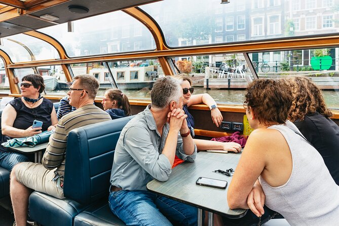 Amsterdam City Centre Cruise on heated boat with Audioguide - Price and Value at About $14.86: What’s Included, What Isn’t