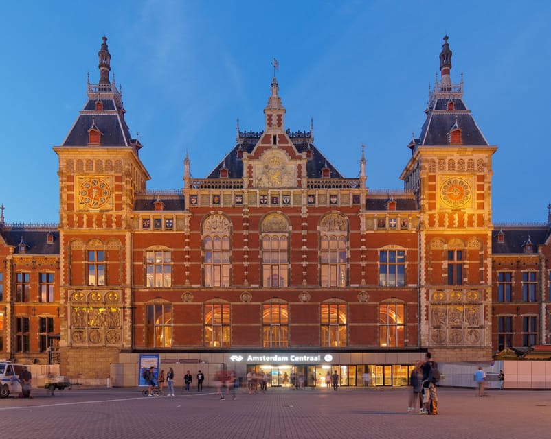 Amsterdam: City Highlights Walking Tour - Damrak, Magna Plaza, and De Bijenkorf: The Shopping Streets as Storytelling