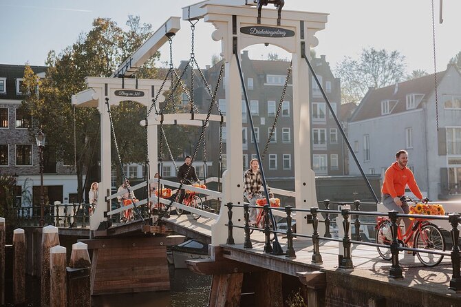 Amsterdam City Top Highlights Guided Bike Tour - Anne Frank House: a short, emotional opener with separate entry