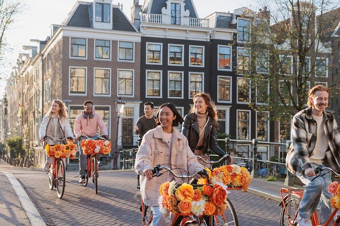 Amsterdam City Top Highlights Guided Bike Tour - Charming street segment and the Red Light District pass