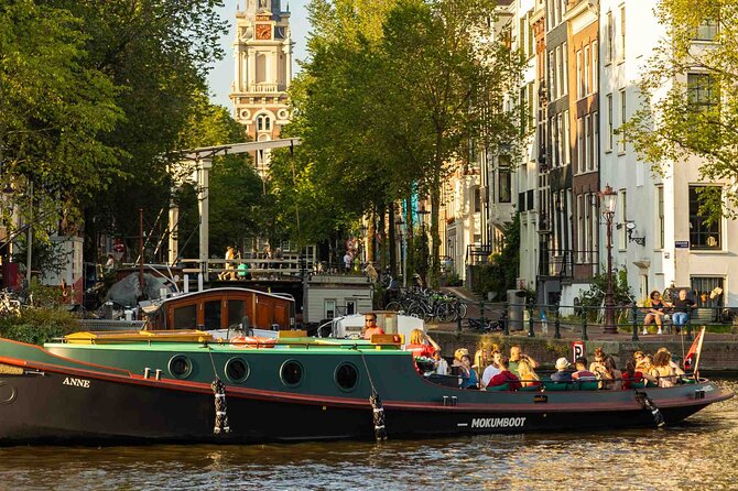 Amsterdam Classic Canal Cruise on a Historic Tugboat - A 1487 defense tower and what it signals about old Amsterdam