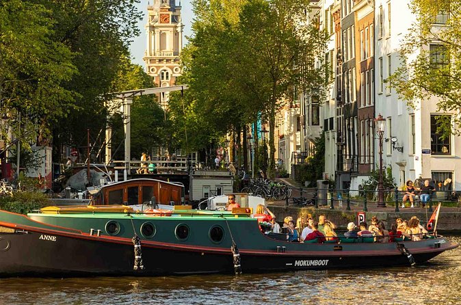 Amsterdam Classic Canal Cruise on a Historic Tugboat - Narrow canal houses that look like they wobble