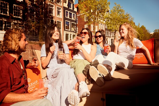 Amsterdam Classic Saloon Boat Canal Cruise with Live Guide - The route: tilted houses, the 7 Bridges, and the Amstel lifeline