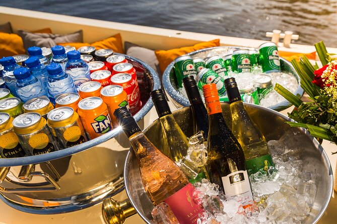 Amsterdam Classic Saloon Boat Canal Cruise with Live Guide - Timing tips: morning clarity vs after-dark charm