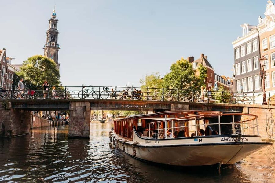 Amsterdam: Classic Saloon Boat Cruise with Cheese & Wine - Where you meet the boat: start options and how they affect your timing