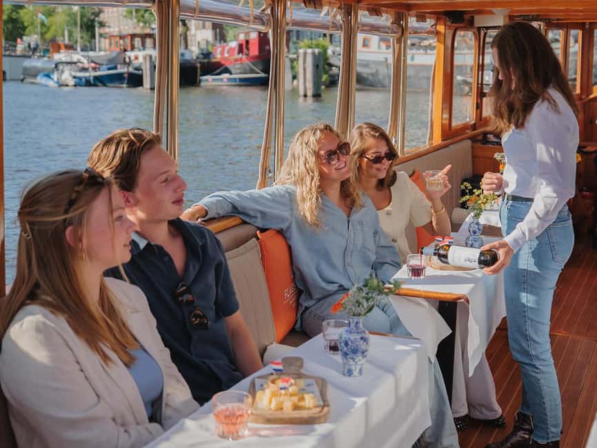 Amsterdam: Classic Saloon Boat Cruise with Cheese & Wine - UNESCO canals in motion: what you’ll see along the route
