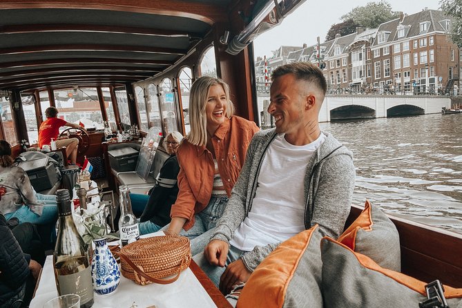 Amsterdam Classic Saloon Boat Cruise with Drinks and Cheese - Anne Frank House to the Westerkerk: Turning Landmarks Into Stories