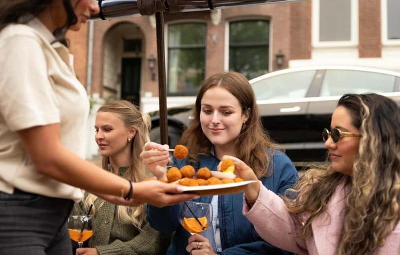 Amsterdam: Covered Heated Canal Cruise with Bitterballen - The crew makes the story (hosts like Daniel, Enno, Jaro, Roman, Jasmine)