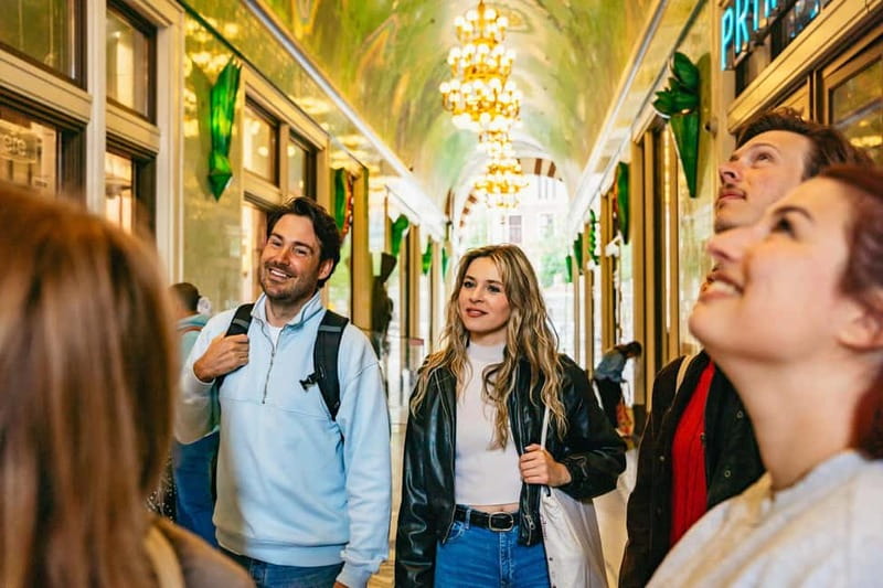 Amsterdam: Cultural Highlights Walking Tour - Begijnhof: The calm pause where the city slows down