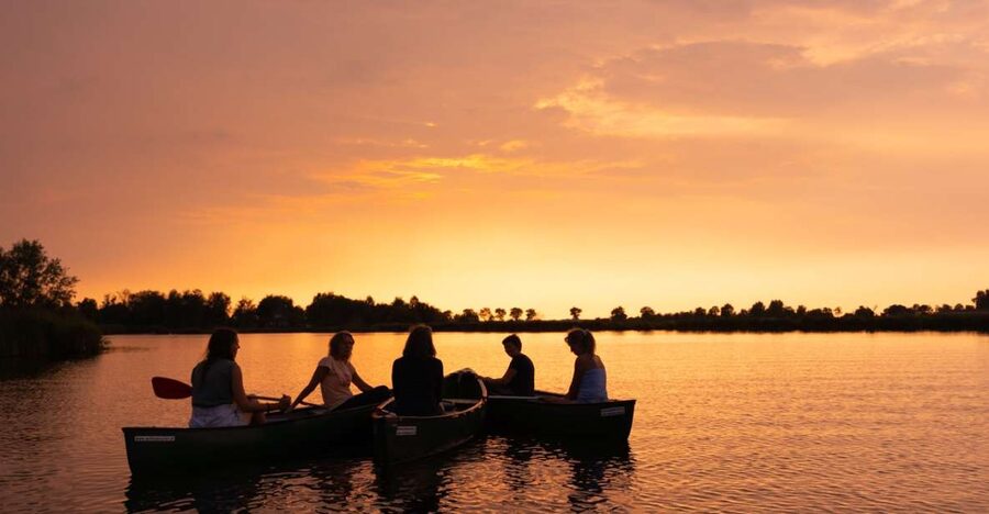 Amsterdam: Dutch Countryside Sunset Canoe Tour - Canoeing at golden hour: polders, farmhouses, mills, and wildlife